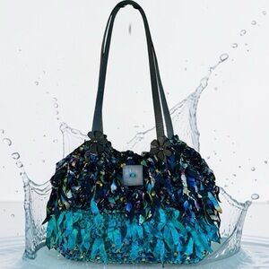 Gorgeous homemade fringe shoulder bag.